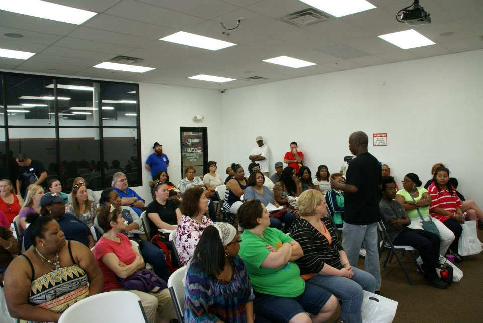 Rick Ector teaching a Michigan CPL class to a full classroom of students in Detroit